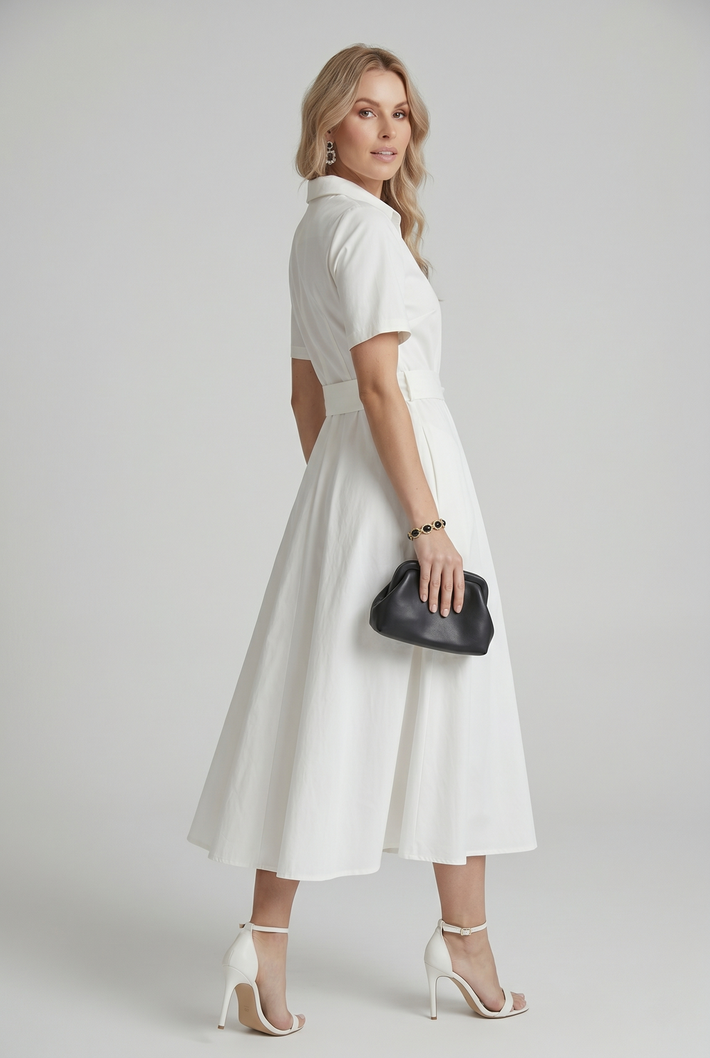 Abito Midi Bianco con Cintura Annodata e Linea Elegante